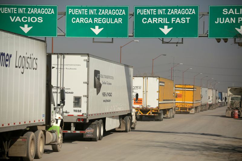 Trucks wait in a queue for border customs control at the Zaragoza-Ysleta border crossing bridge in Ciudad Juarez