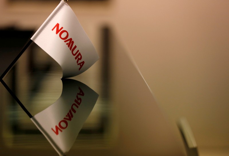FILE PHOTO: Logo of Nomura Securities is pictured at the company's Otemachi Head Office in Tokyo