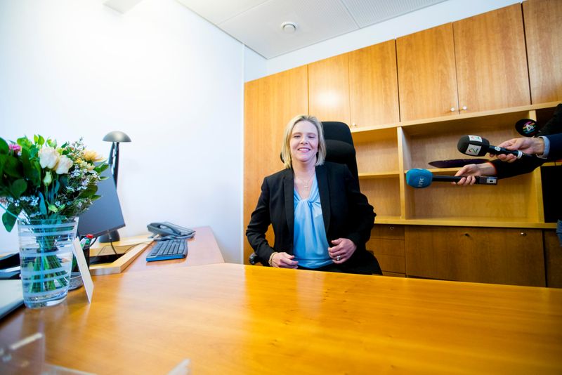 Sylvi Listhaug sits at the desk after she was introduced as the new Senior and Public Health Minister, in Oslo