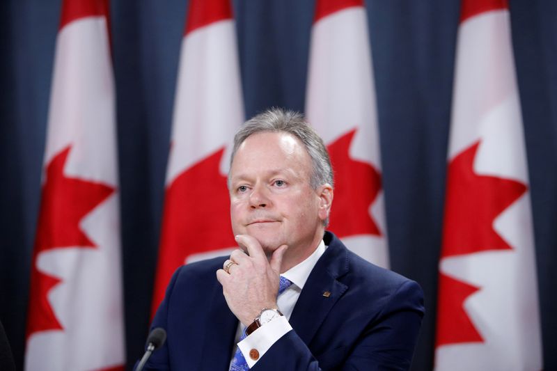 FILE PHOTO: Bank of Canada Governor Stephen Poloz takes part in a news conference in Ottawa