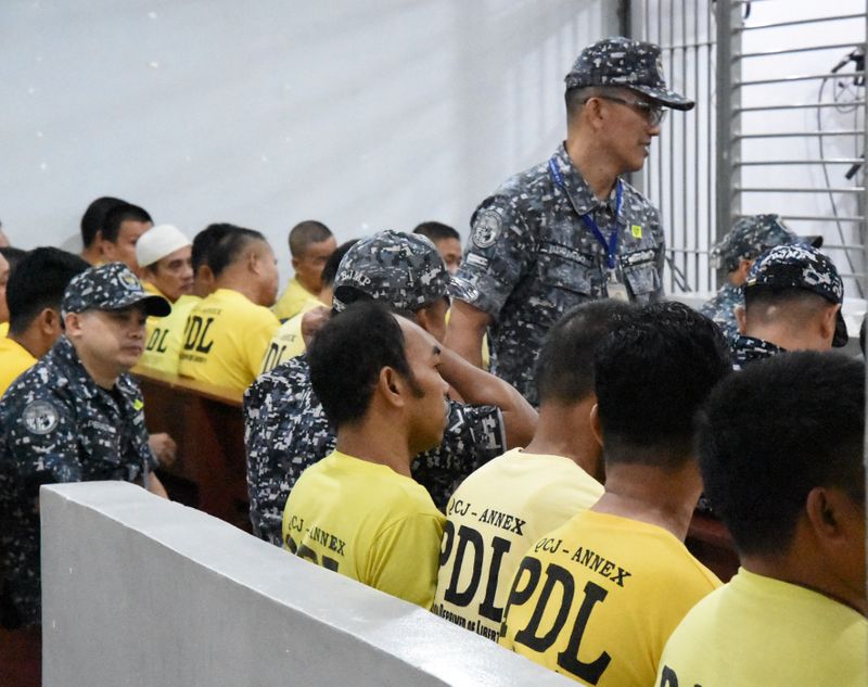 Some of the accused in the 2009 Maguindanao Massacre are seen attending the promulgation of the case, inside a prison facility in Taguig City