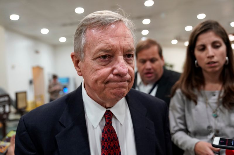 Senator Richard Durbin (D-IL) speaks to reporters as he arrives for a vote on Capitol Hill in Washington