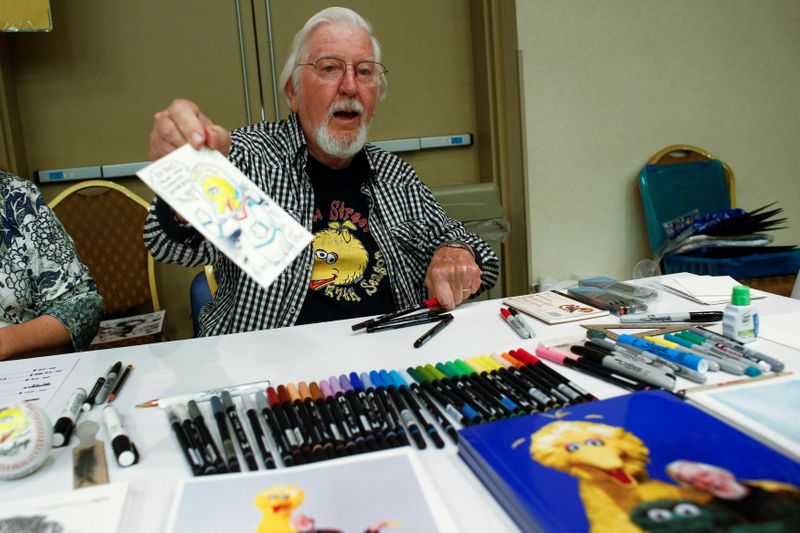 FILE PHOTO: Spinney signs autographs during Dean Martin Expo and Nostalgic, Comedy and Comic Convention in New York
