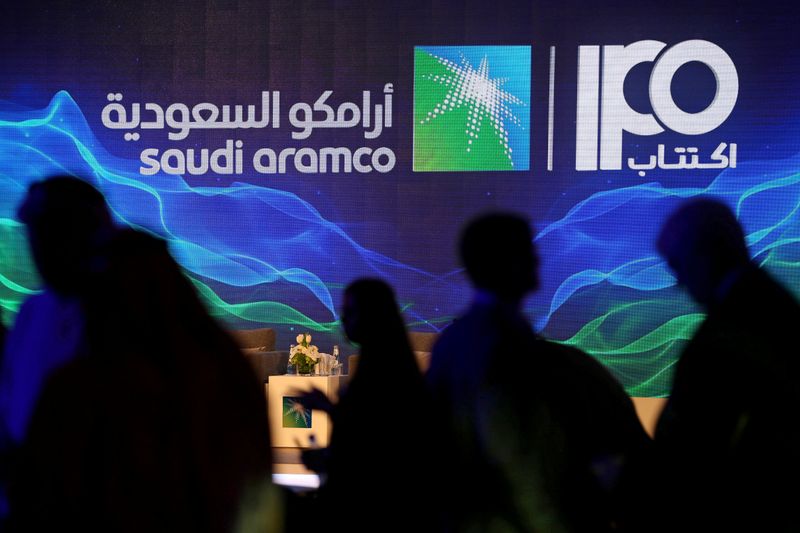 FILE PHOTO: Sign of Saudi Aramco's IPO is seen during a news conference by the state oil company in Dhahran
