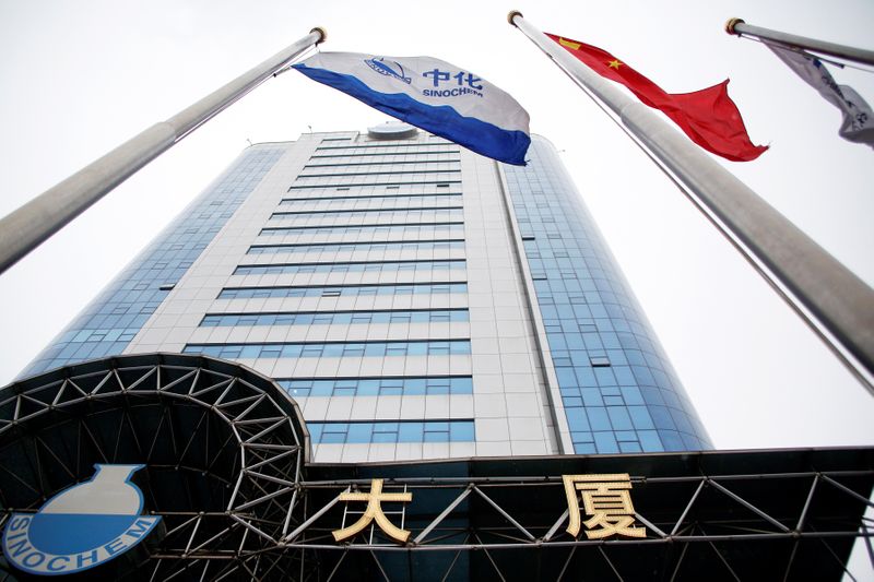 A logo of Sinochem is seen outside an office building of Sinochem in Beijing