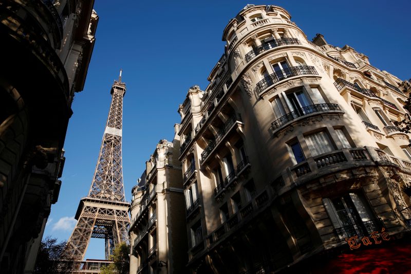 FILE PHOTO: The Eiffel Tower stands near luxury Haussmannian buildings in the 7th arrondissement district of Paris