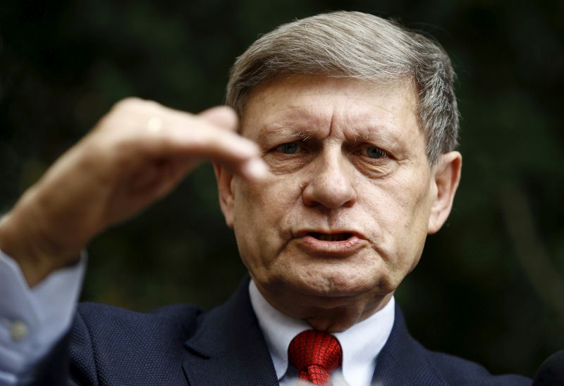 FILE PHOTO: Leszek Balcerowicz attends a news conference in Warsaw