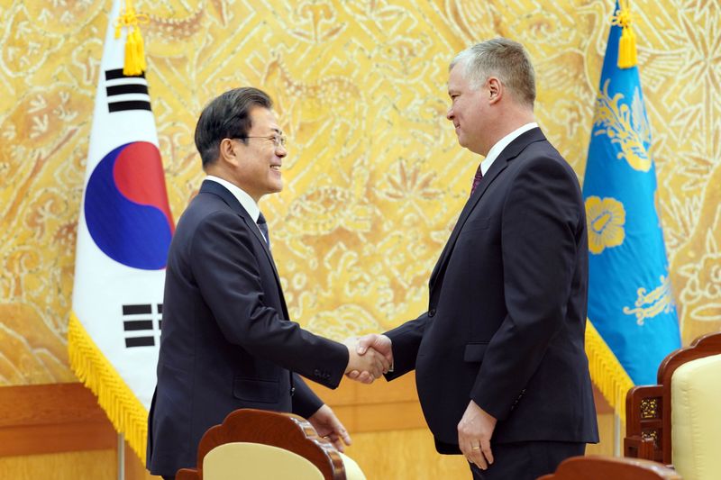 U.S. Special Representative for North Korea Stephen Biegun is greeted by South Korean President Moon Jae-in during their meeting at the Presidential Blue House in Seoul