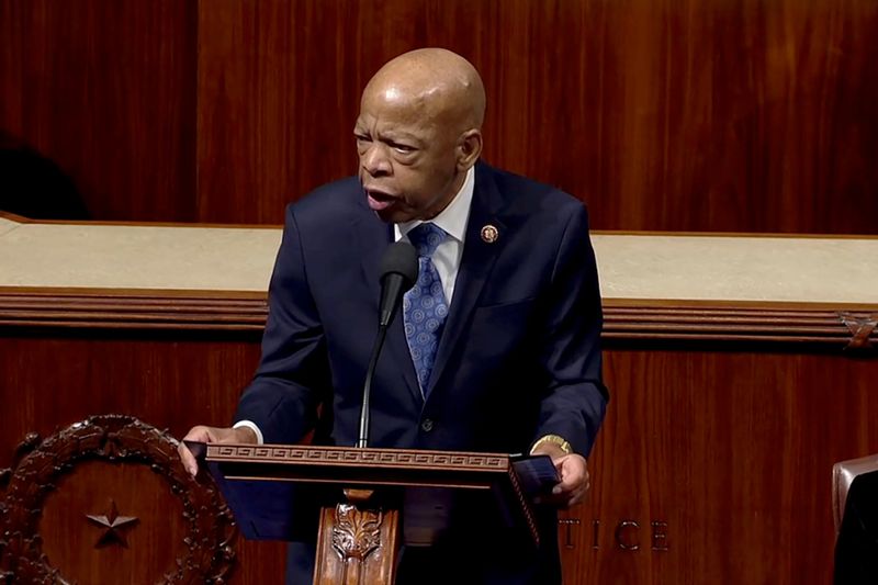 FILE PHOTO: Rep. John Lewis speaks ahead of a vote on impeachment against President Trump on Capitol Hill