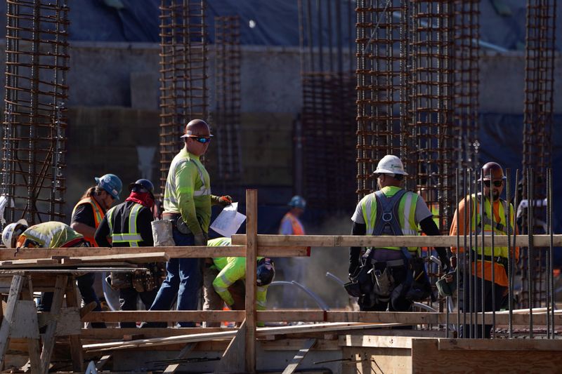 FILE PHOTO: Work crews construct a new hotel complex on oceanfront property in Encinitas, California