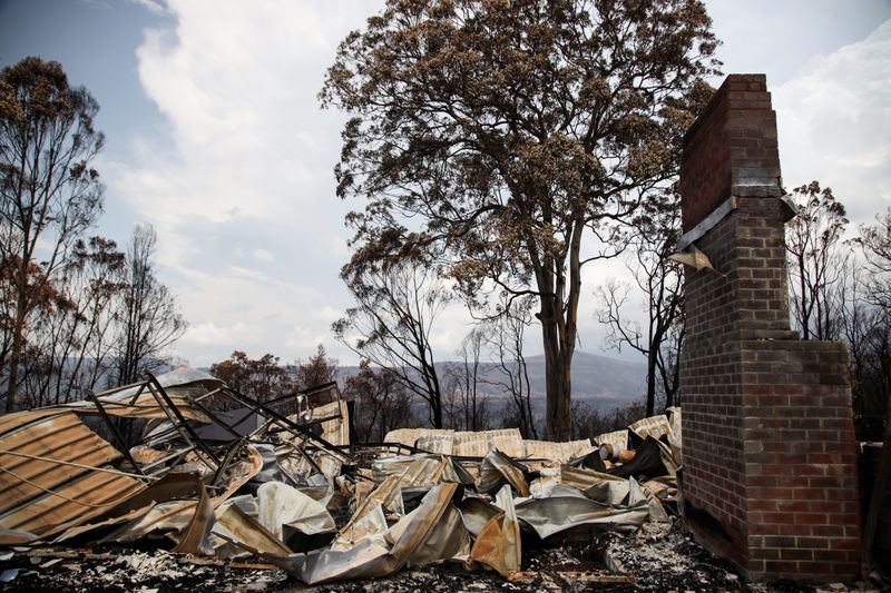 Rubble are seen at a property damaged by bushfires in Kangaroo Valley, Australia