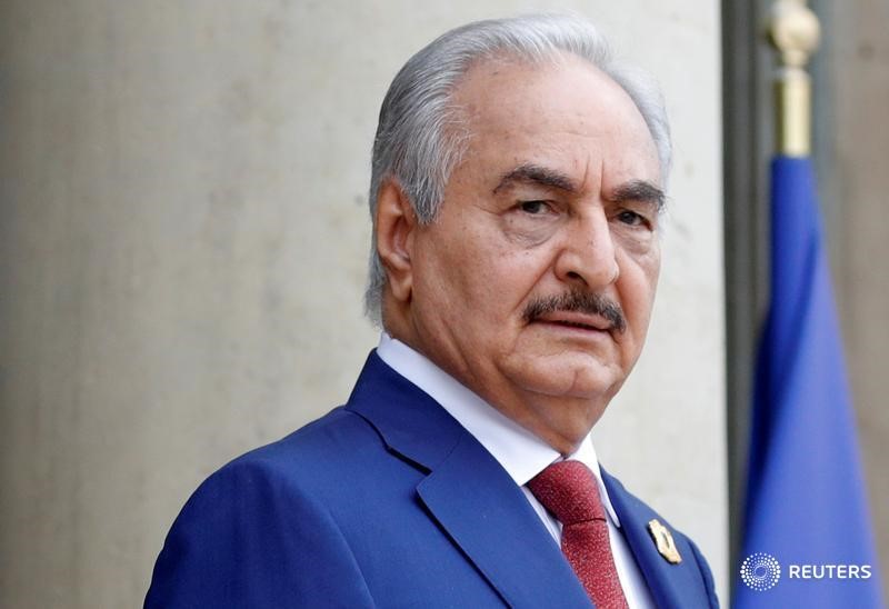 FILE PHOTO: Khalifa Haftar, the military commander who dominates eastern Libya, arrives to attend an international conference on Libya at the Elysee Palace in Paris