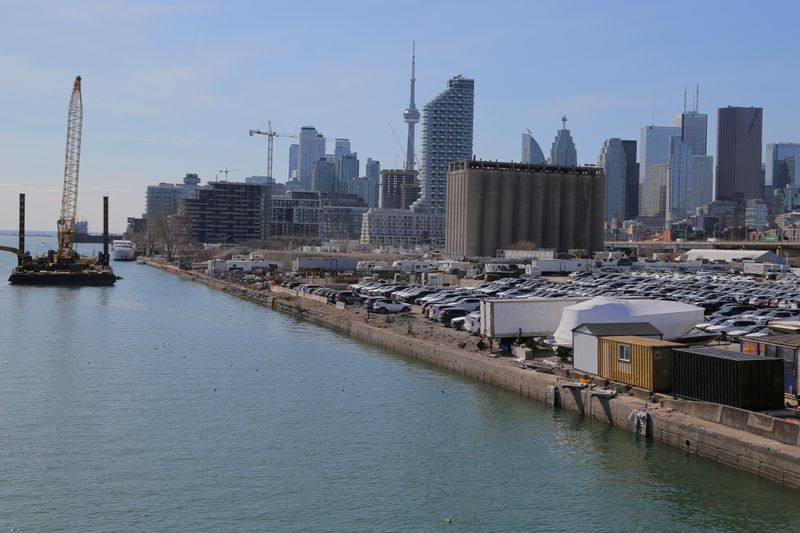 FILE PHOTO: The downtown skyline and CN Tower are seen past the eastern waterfront area of Toronto