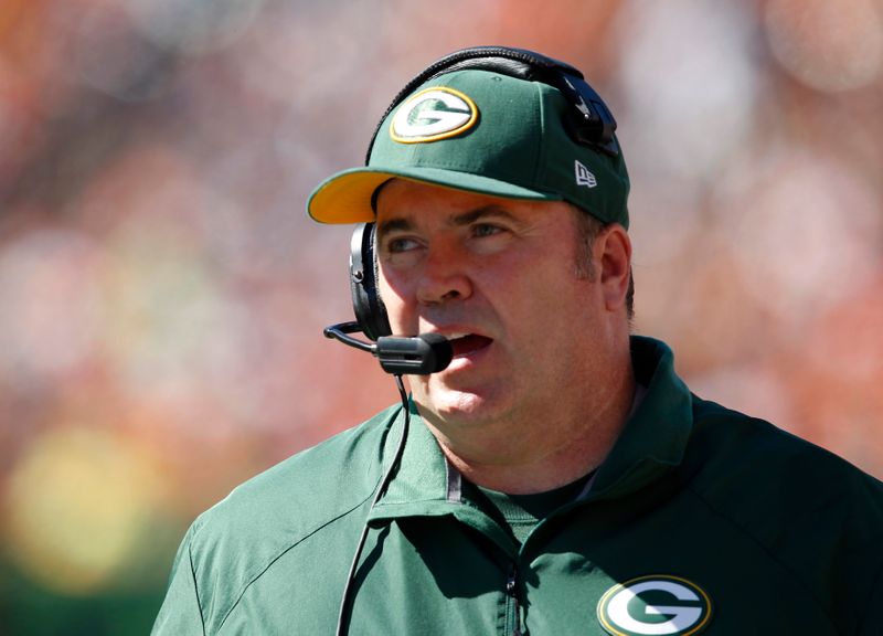 Green Bay Packers head coach Mike McCarthy reacts to his teams play against theCincinnati Bengals in their NFL football game at Paul Brown Stadium in Cincinnati