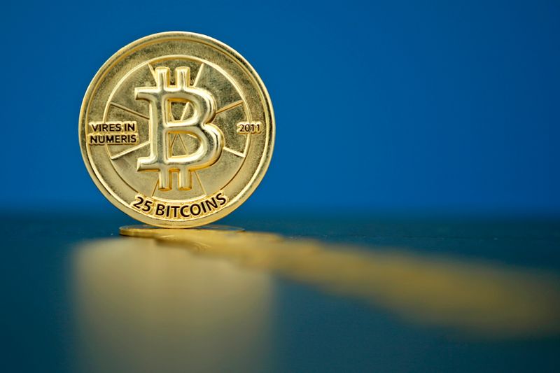 An illustration photo of Bitcoin (virtual currency) coins are seen at La Maison du Bitcoin in Paris