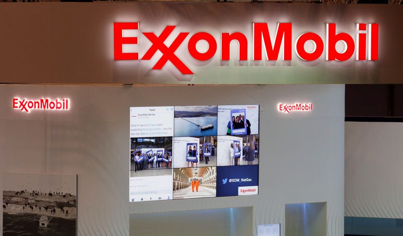 seFILE PHOTO: Logos of ExxonMobil are seen in its booth at Gastech, the world's biggest expo for the gas industry, in Chiba