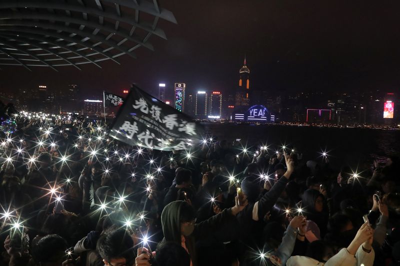 Anti-government demonstrators protest on New Year’s Eve in Hong Kong