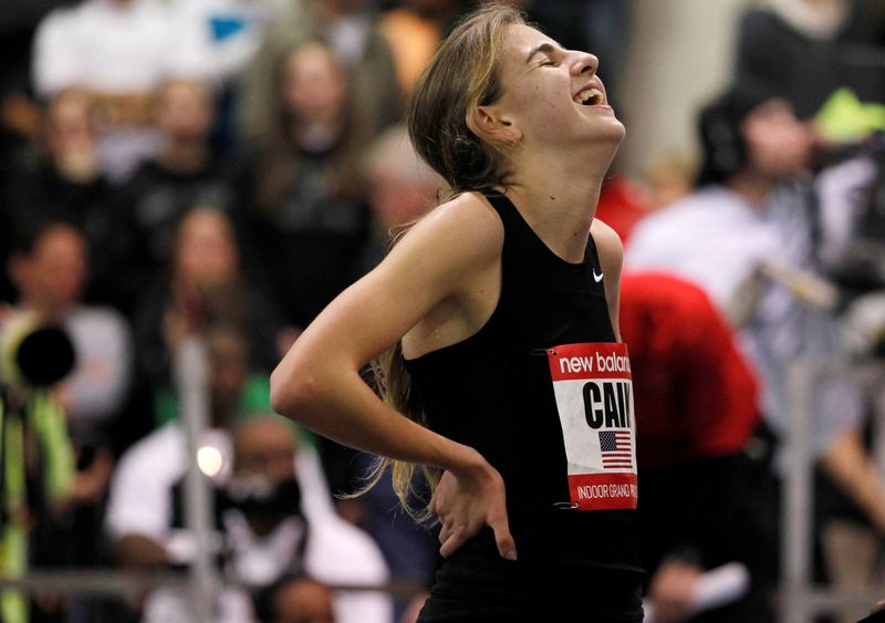 FILE PHOTO: Mary Cain reacts as she is interviewed after breaking the high school girls' record during the women's two mile event during the New Balance Indoor Grand Prix track meet in Boston