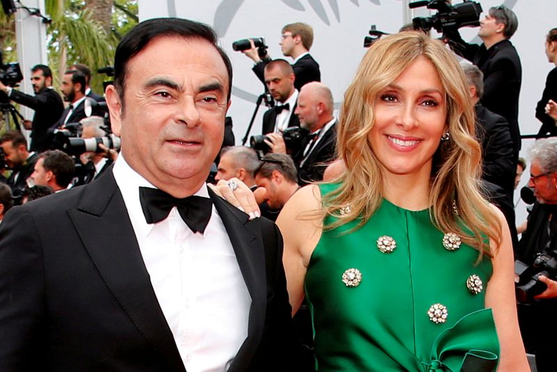 FILE PHOTO: Carlos Ghosn, Chairman and CEO of the Renault-Nissan Alliance, and his wife Carole pose during the 70th Cannes Film Festival