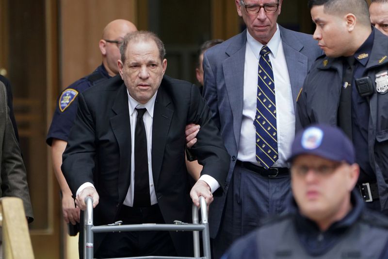 FILE PHOTO: Film producer Harvey Weinstein departs Criminal Court on first day of sexual assault trial in New York