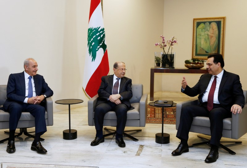 Designated Prime Minister Hassan Diab meets with Lebanon's President Michel Aoun and Lebanese Speaker of the Parliament Nabih Berri at the presidential palace in Baabda