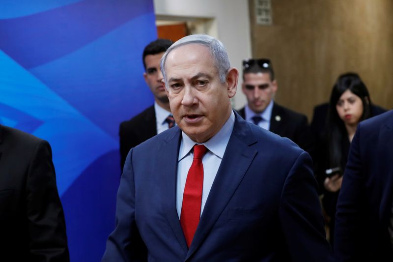 Israel's Prime Minister Benjamin Netanyahu arrives to the weekly cabinet meeting in Jerusalem