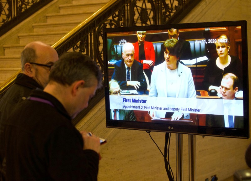 Television screen in the great hall shows First Minister, Arlene Foster speaking as politicians in Northern Ireland returned to the Stormont Assembly after backing a deal to restore devolution in Belfast