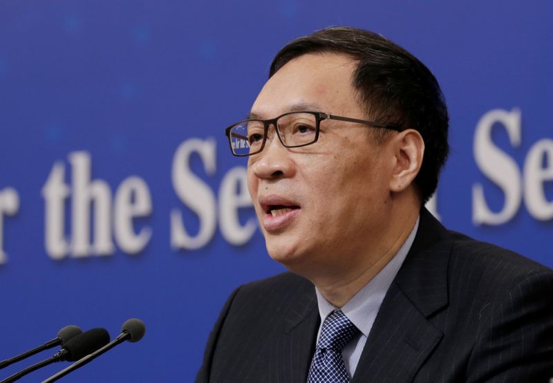 FILE PHOTO:Fan Yifei, vice governor of the PBOC, attends a news conference during ongoing session of the NPC in Beijing