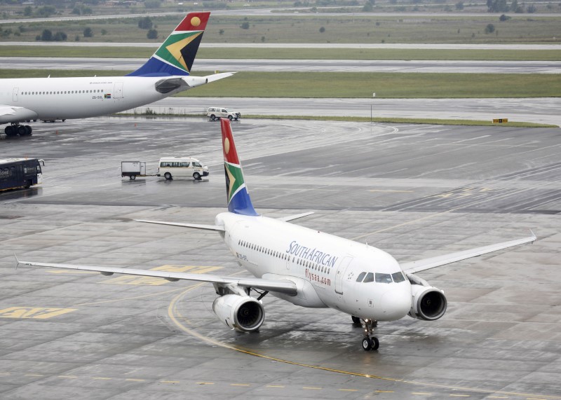 South African Airways (SAA) plane taxis after landing at O.R. Tambo International Airport in Johannesburg