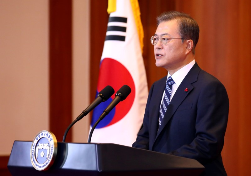 South Korea's President Moon Jae-in delivers a New Year address at the Presidential Blue House in Seoul