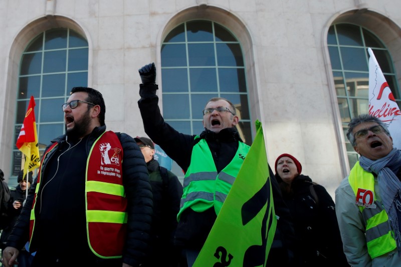 FILE PHOTO: Striking workers demonstrate in Versailles as France faces its 47th day of strikes