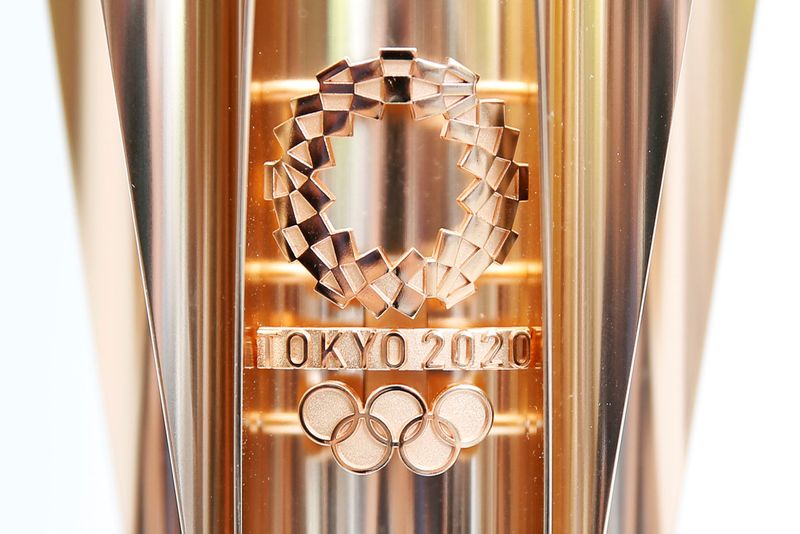 The Olympic torch of the Tokyo 2020 Olympic Games is displayed at a Torch Relay event to mark the 300-day milestone to the starting date of the torch relay, in Tokyo