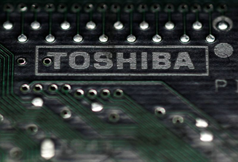 FILE PHOTO: A logo of Toshiba is seen on a printed circuit board in this photo illustration taken in Tokyo