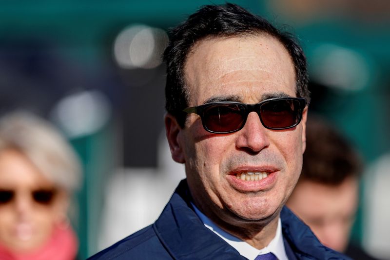 FILE PHOTO: U.S. Treasury Secretary Mnuchin speaks to reporters outside the White House in Washington