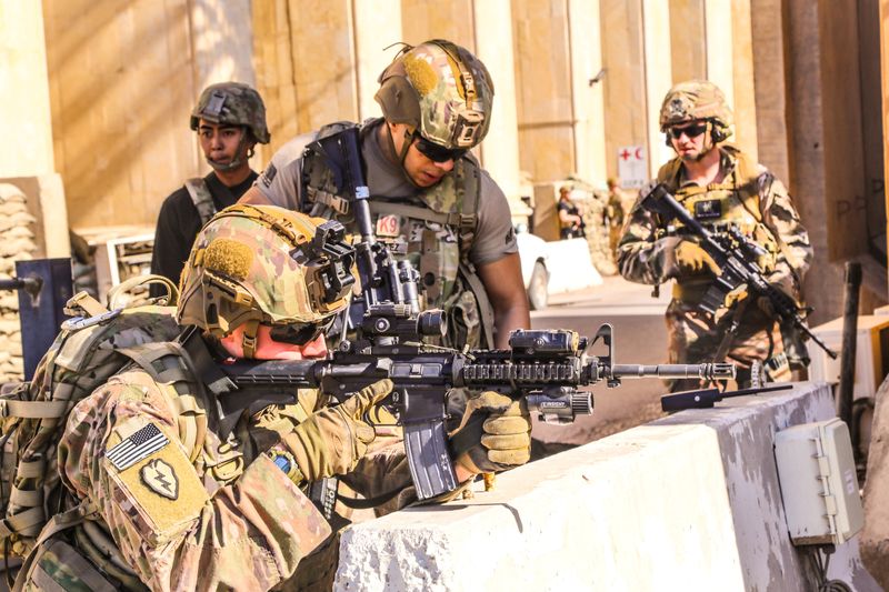 U.S. Army soldiers man a defensive position at Forward Operating Base Union III in Baghdad