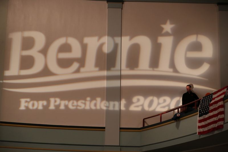 A man attends a Democratic 2020 U.S. presidential candidate Bernie Sanders campaign rally in Ames, Iowa,