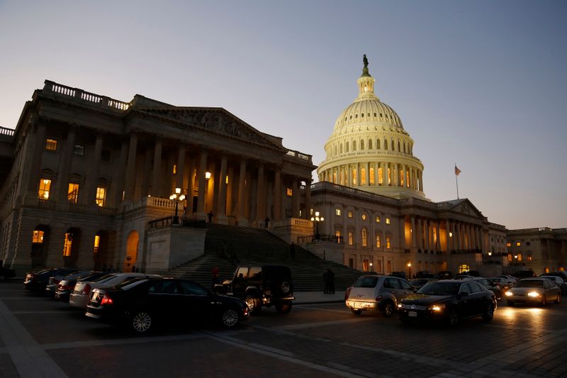 Night falls over U.S. Capitol Dome, as members of Republican-controlled U.S. House of Representatives deal with budget showdown with Democratic-controlled U.S. Senate, and possible government shutdown in Washington