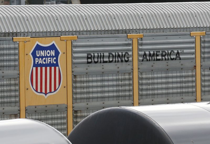 A Union Pacific rail car is parked at a Burlington National Santa Fe (BNSF) train yard in Seattle