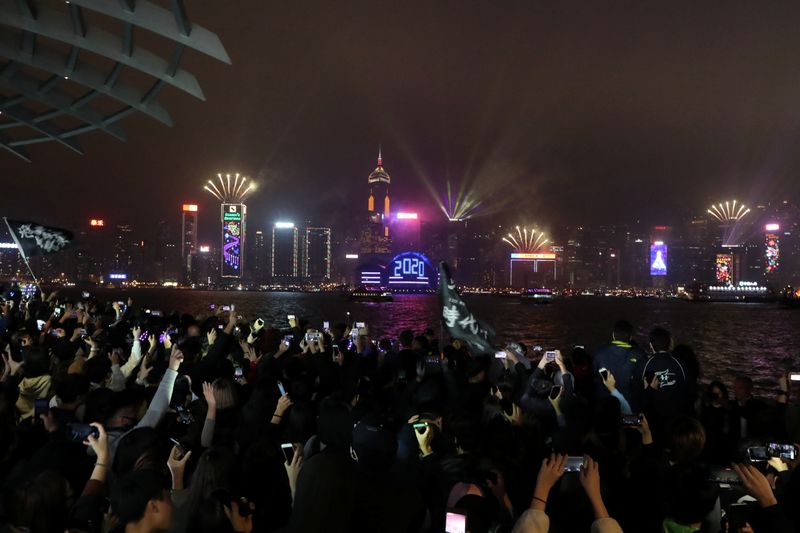 Anti-government demonstrators protest on New Year’s Eve in Hong Kong