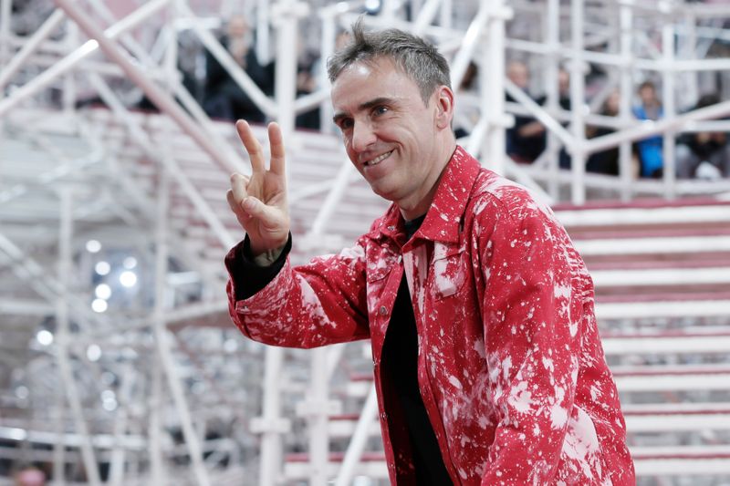 Belgian designer Raf Simons appears at the end of his Haute Couture Spring Summer 2015 fashion show for French fashion house Christian Dior in Paris