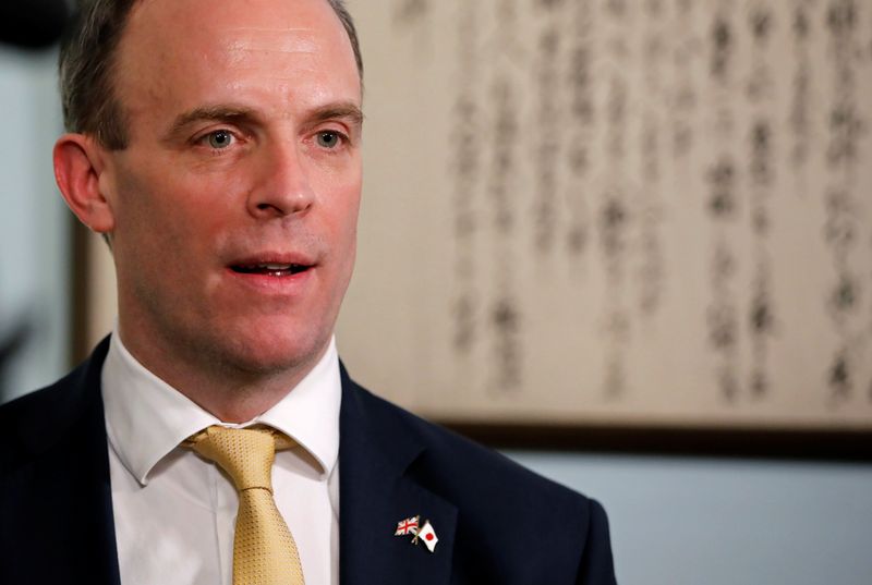 FILE PHOTO: British Foreign Secretary Dominic Raab talks during an interview with Reuters at British Embassy in Tokyo, Japan