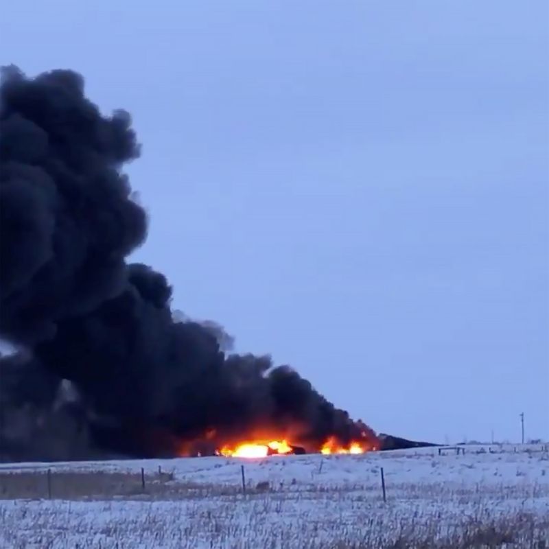 Black smoke and blaze rising from the derailed Canadian Pacific train in Guernsey, Saskatchewan