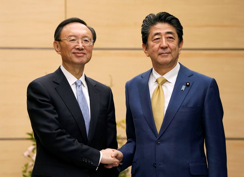 Yang Jiechi, Politburo member of the Communist Party of China, meets Japanese Prime Minister Shinzo Abe in Tokyo