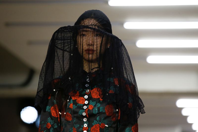 Model presents creation during the Yuhan Wang catwalk show at London Fashion Week in London