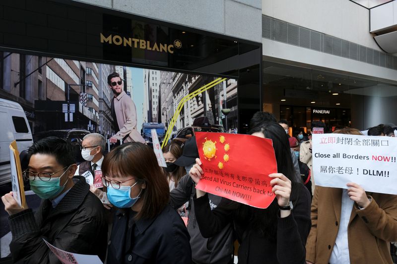 Supporters of medical workers hold a flash mob protest to back their strike to demand Hong Kong closing its border with China to reduce the coronavirus spreading, in Hong Kong