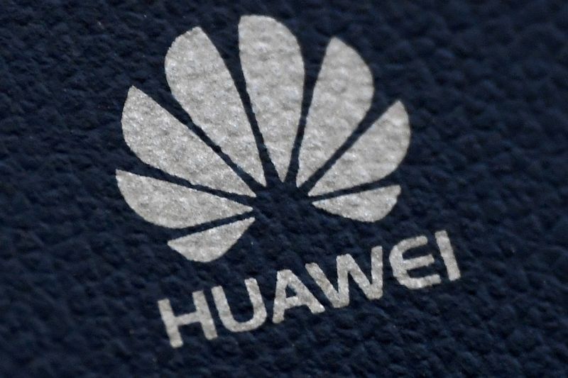 FILE PHOTO: The Huawei logo is seen on a communications device in London, Britain