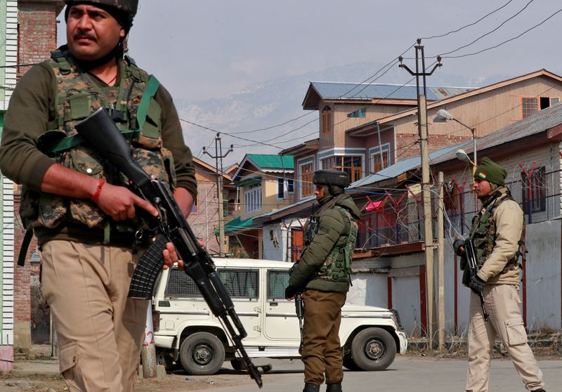 FILE PHOTO: Indian security forces stand guard at the site of a grenade explosion in Srinagar