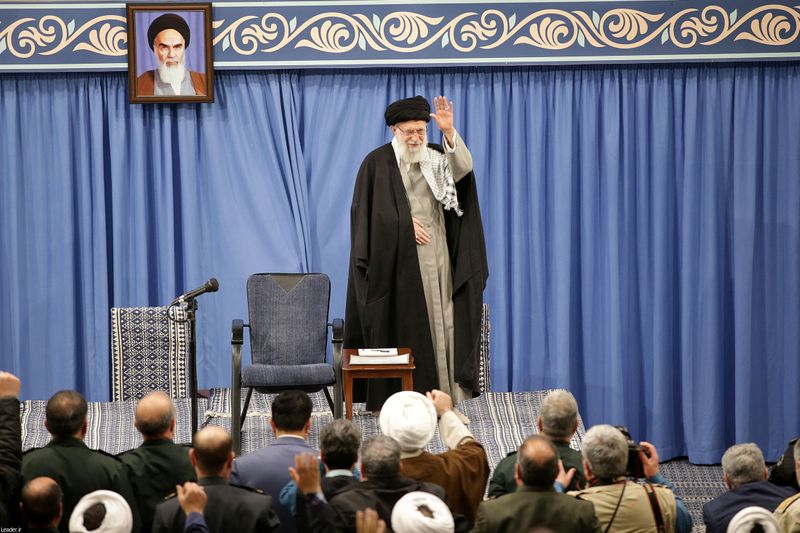 FILE PHOTO: Iran's Supreme Leader Ayatollah Ali Khamenei waves as he meets with people, in Tehran