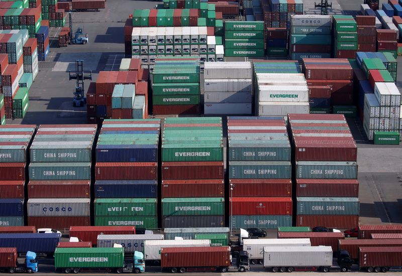 FILE PHOTO: Shipping containers are seen at a port in Tokyo, Japan