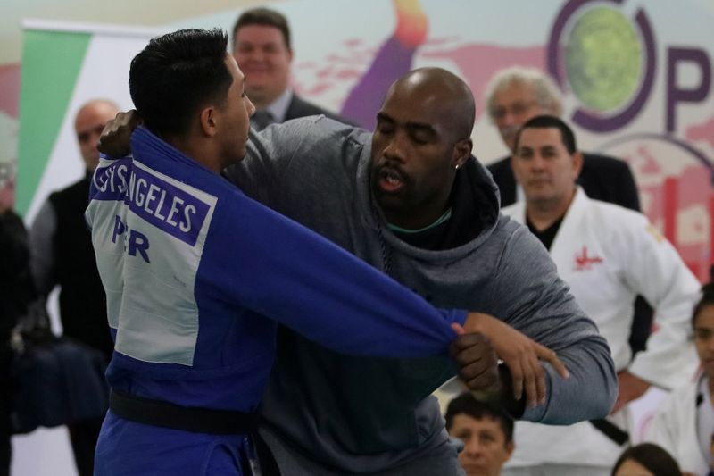 Olympic Judo champion Teddy Riner takes part in a demostration of Judo with Peruvian Judo athletes ahead of the opening of the 131st IOC Session in Lima